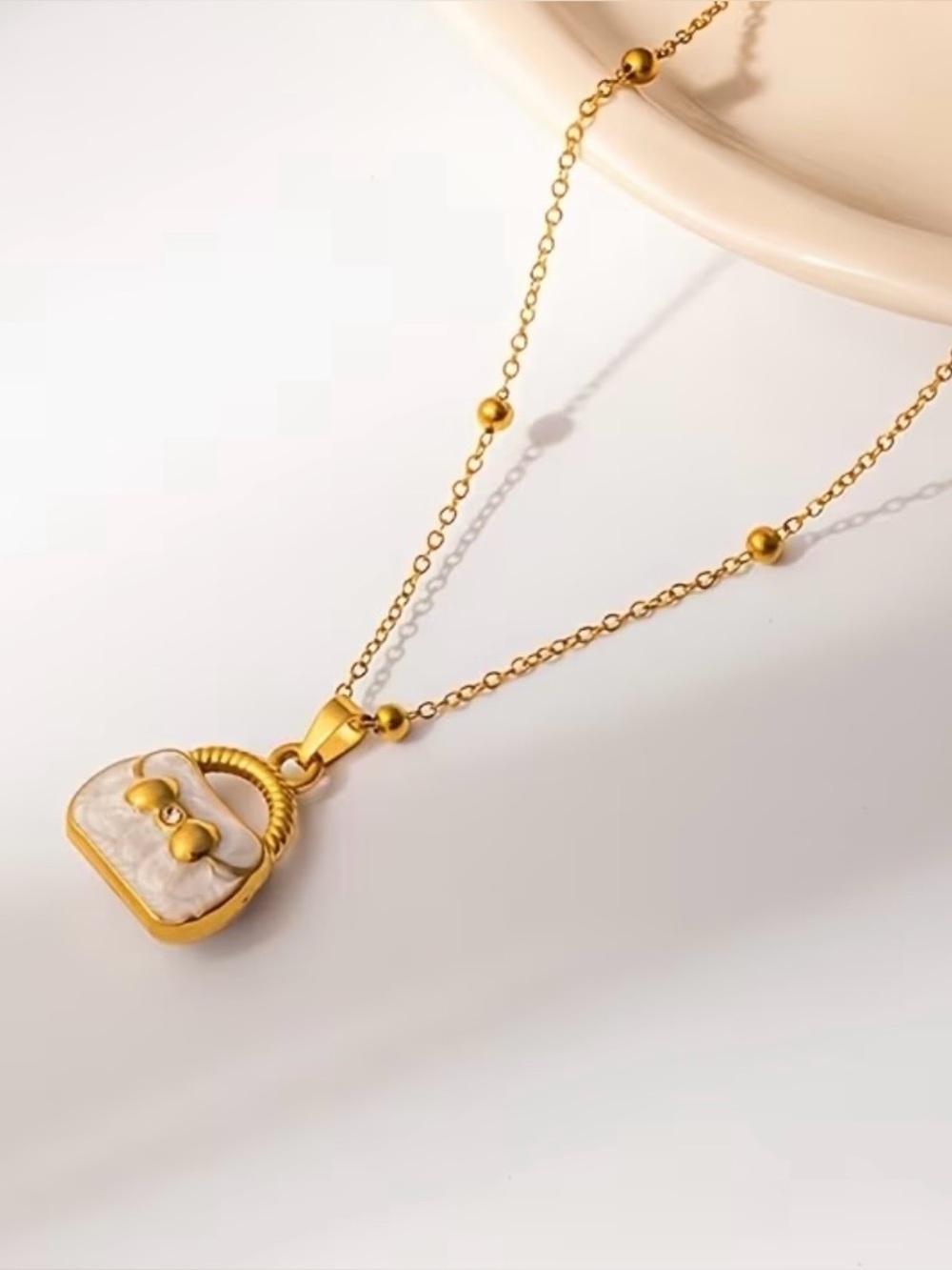 Gold-Tone White Enamel Handbag Pendant Necklace